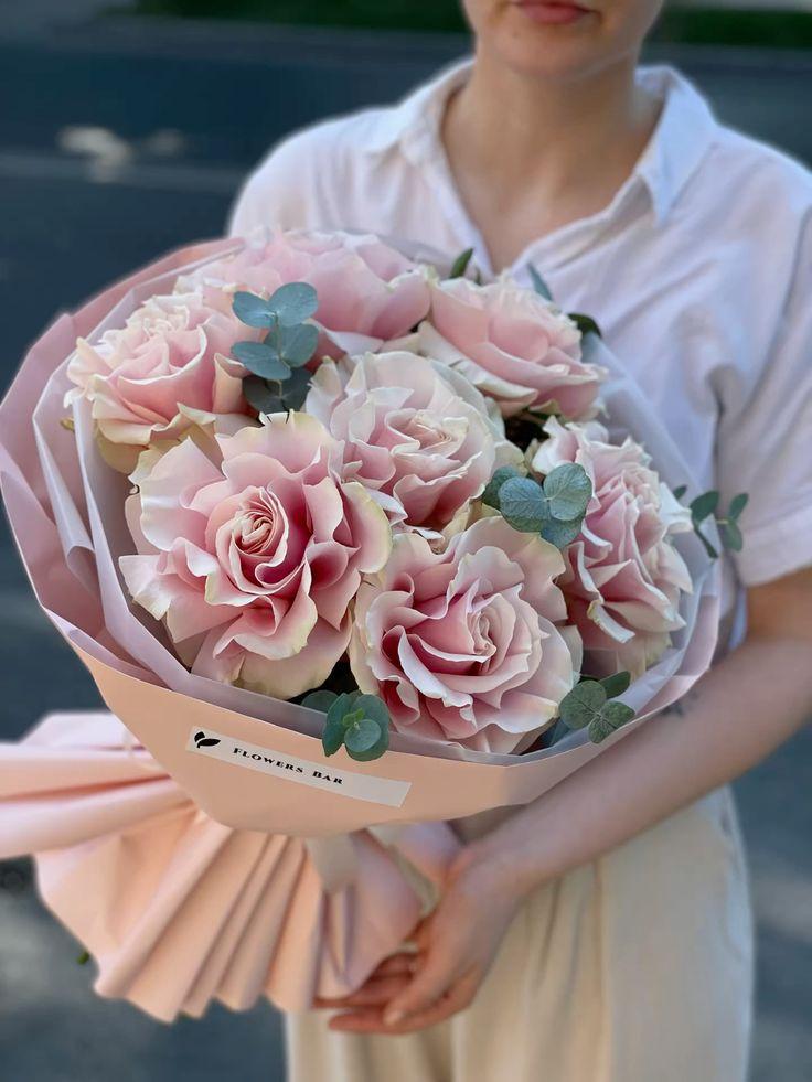 Corporate meeting room with carefully timed floral arrangements that maintain elegance throughout business hours